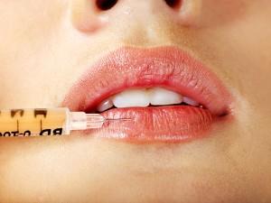 woman having botox injections and lip fillers