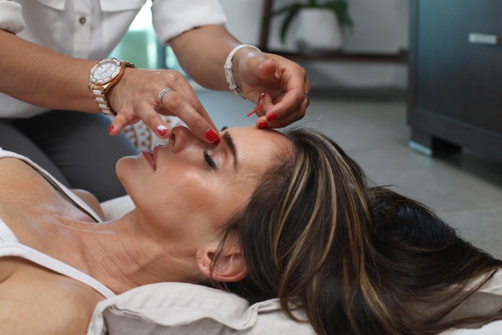 certified beautician doing face massage