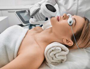 Photorejuvenation rosacea treatment removing brown spots and vascular mesh Cosmetologist using IPL apparatus treats skin of female patients face › Hellenic Laser Spa